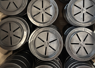 Round, black plastic parts