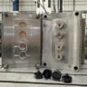 Large mould tool with injection moulded plastic parts